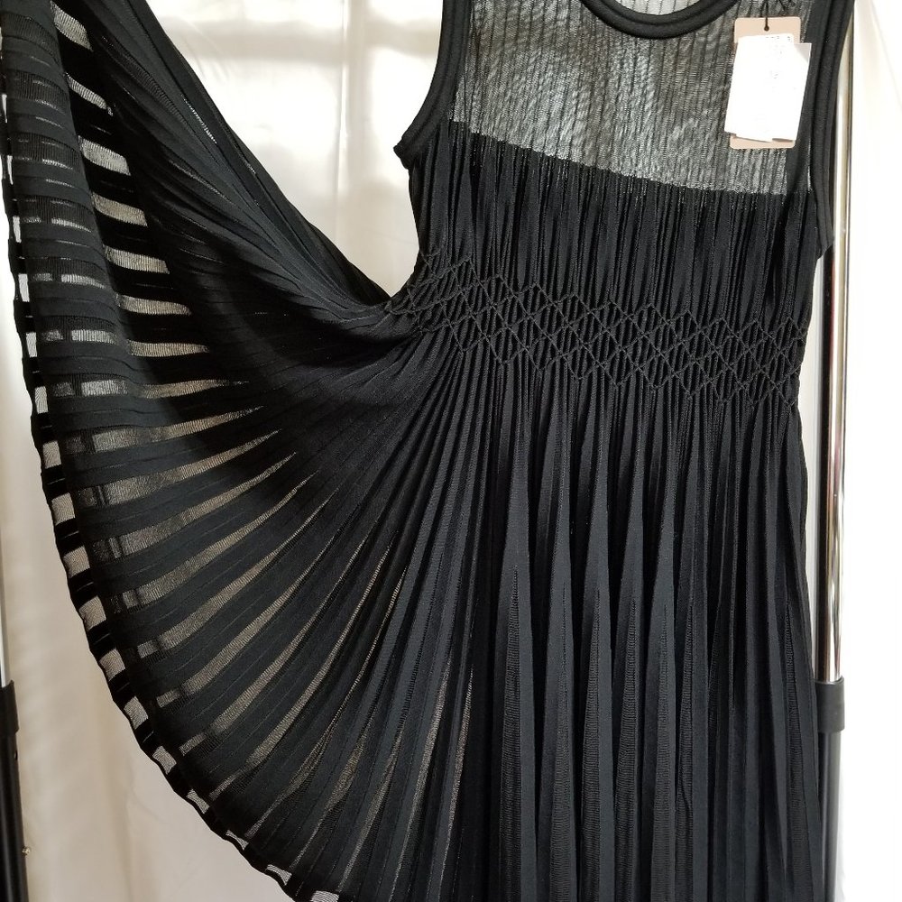 New Alaia knitted dress size 38 Black color.Made in Italy.